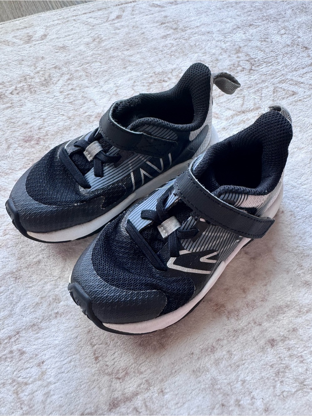 New Balance Black and White Kids Velcro Athletic Sneakers